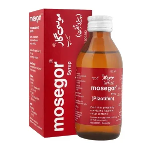 Box and brown glass bottle of Mosegor Syrup (Pizotifen) Mandarine Flavoured by Novartis Pakistan — 120ml syrup for children and adults.