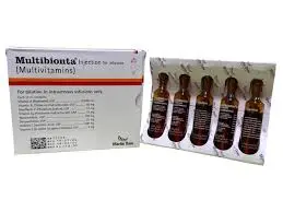 Multibionta Multivitamin Injection ampoules pack by Martin Dow, for intravenous infusion, brown glass ampoules in white and red packaging
